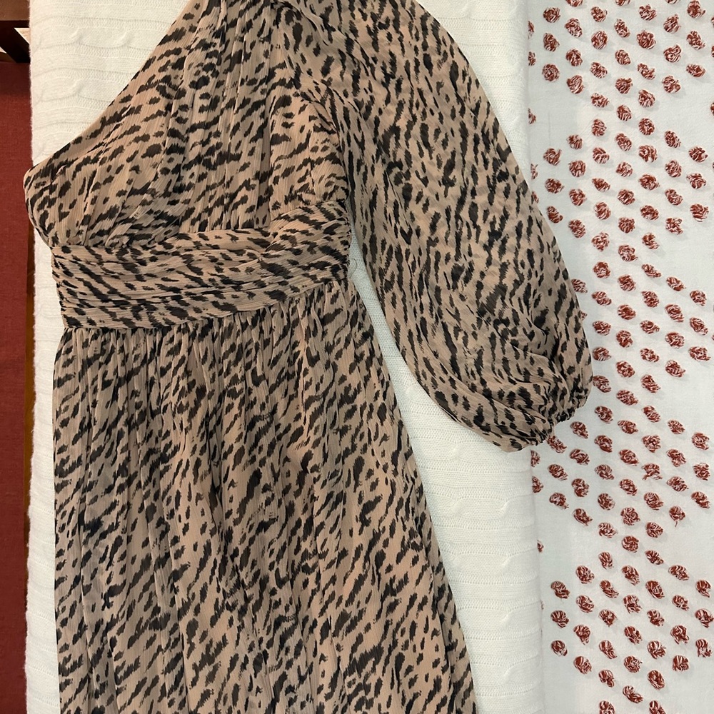 Beautiful animal print, one shoulder gown , perfect for a wedding or gala.